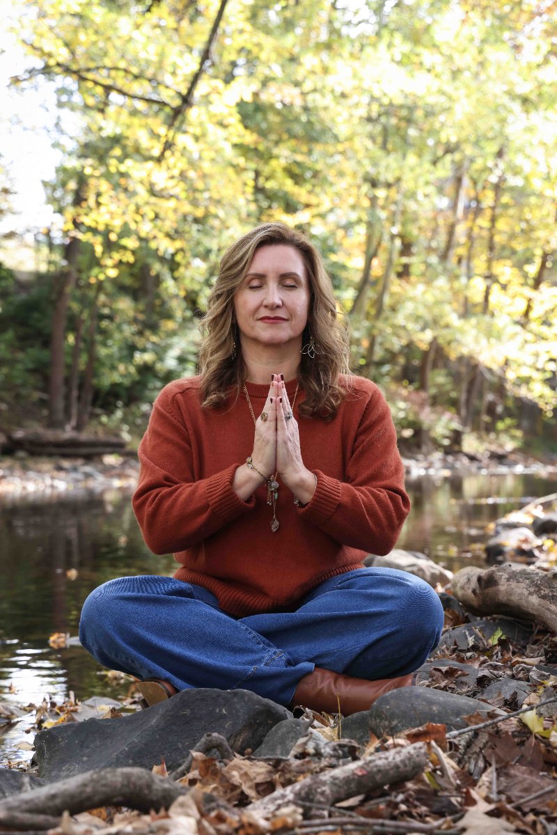 Christine Dorsey in a woodland setting during an energy session